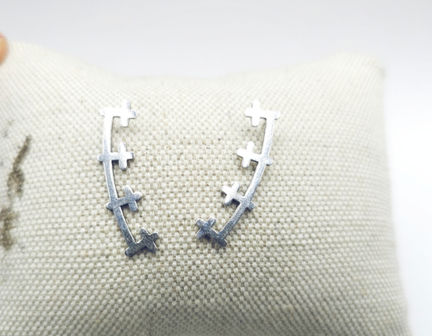 Pendientes trepadores de cruces
