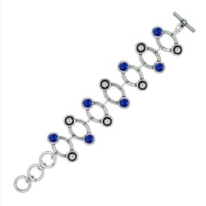 Pulsera con piezas ovaladas con punto y cristal